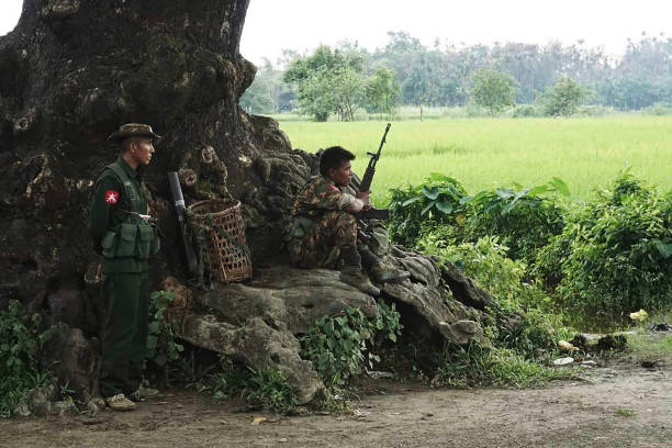 Myanmar Soldiers Stand Guard at a Check Post